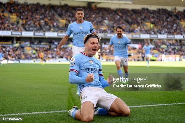 Jack Grealish of Manchester City celebrates after scoring their side's first goal during the Premier League match between Wolverhampton Wanderers and...