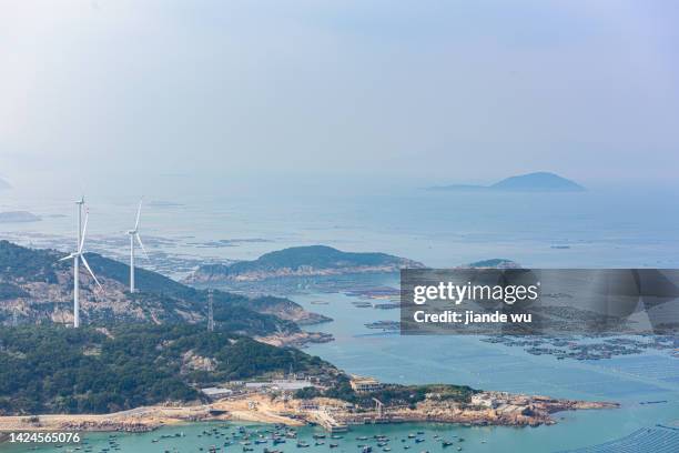wind power stations on ocean islands - sea islands stock pictures, royalty-free photos & images