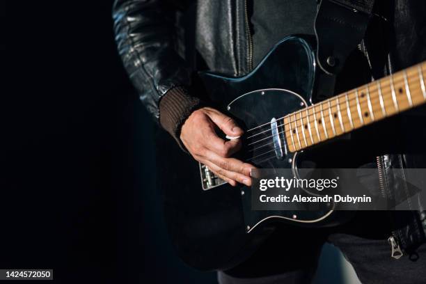 guitar close-up. man playing rock guitar - electric guitarist stock pictures, royalty-free photos & images