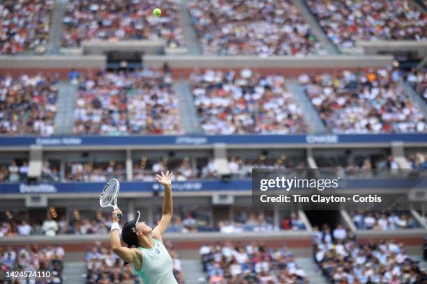 September 10: Iga Swiatek of Poland serving against Ons Jabeur of Tunisia in the Women's Singles Final match on Arthur Ashe Stadium during the US...