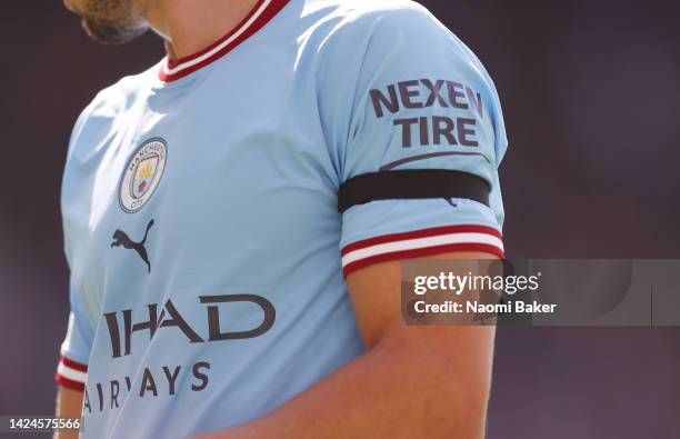 Black armband in seen on the sleeve of Ruben Dias of Manchester City as a mark of respect to Her Majesty Queen Elizabeth II who died at Balmoral...