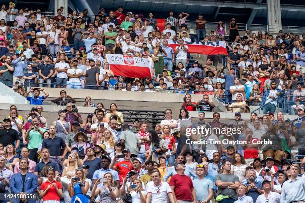 September 10: Polish fans in the crowd cheer on Iga Swiatek of Poland in action against Ons Jabeur of Tunisia in the Women's Singles Final match on...