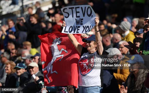 Kent Spitfires fan holds a sign up for Darren Stevens of Kent as he makes his way out to bat during the Royal London Cup Final match between Kent...