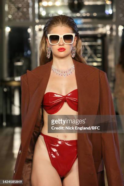 Model walks the runway at the Helen Anthony show during London Fashion Week September 2022 on September 17, 2022 in London, England.