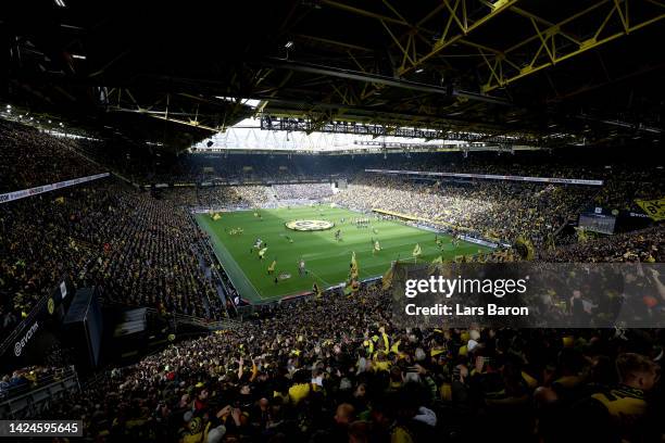 General view inside the stadium as Borussia Dortmund fans show their support prior to the Bundesliga match between Borussia Dortmund and FC Schalke...