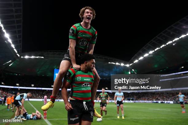 Taane Milne of the Rabbitohs celebrates scoring a try with Campbell Graham of the Rabbitohs during the NRL Semi Final match between the Cronulla...
