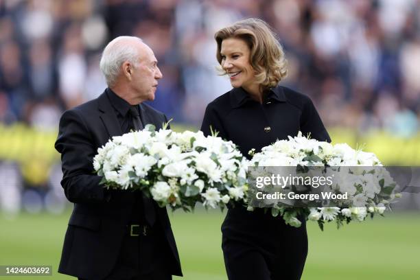 Jeff Mostyn, Chairperson of AFC Bournemouth and Amanda Staveley, Co-Owner of Newcastle United hold a reath to pay tribute to Her Majesty Queen...