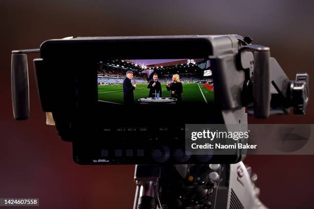 Pundits Jamie Carragher, Gary Neville and Kelly Cates present Friday night football during the Premier League match between Aston Villa and...