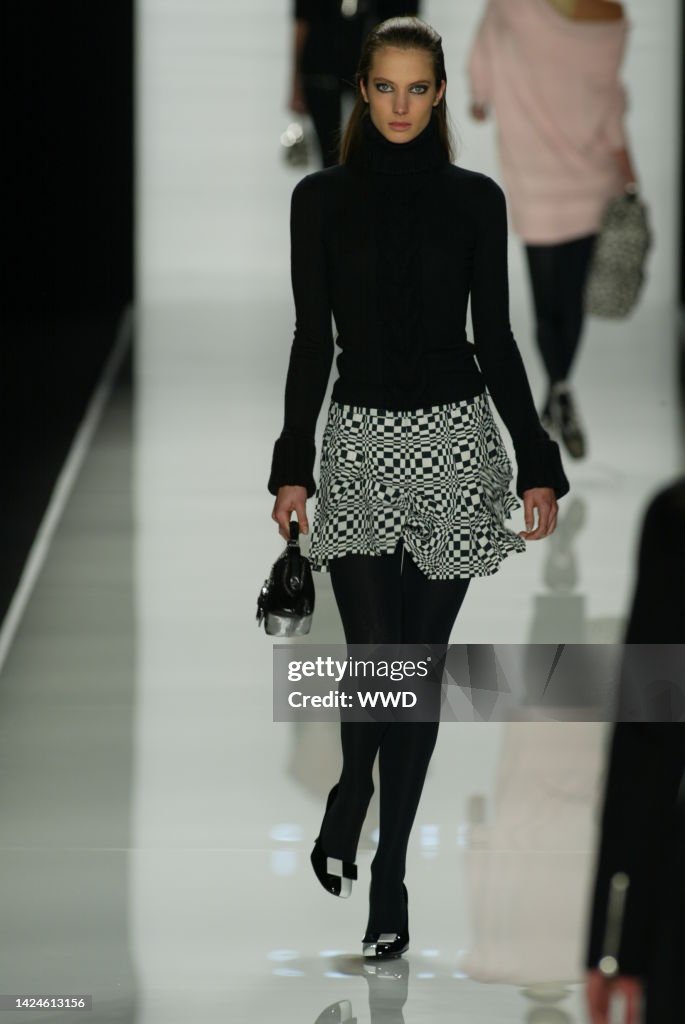 Models 2003 A model walks down the runway at the Fall 2003 Celine show in Paris ...