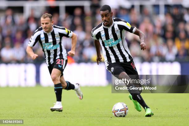 Alexander Isak of Newcastle United runs with the ball during the Premier League match between Newcastle United and AFC Bournemouth at St. James Park...