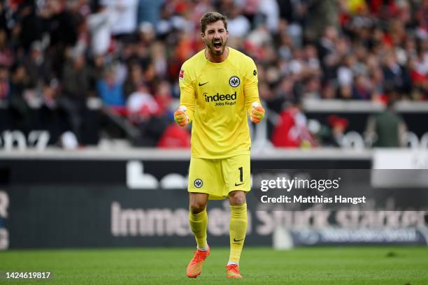 Kevin Trapp of Eintracht Frankfurt celebrates their side's third goal scored by Kristijan Jakic of Eintracht Frankfurt during the Bundesliga match...