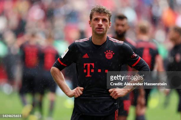 Thomas Muller of Bayern Munich looks dejected following their sides defeat in the Bundesliga match between FC Augsburg and FC Bayern München at...