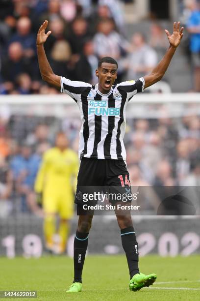 Alexander Isak of Newcastle United celebrates after scoring their side's first goal during the Premier League match between Newcastle United and AFC...