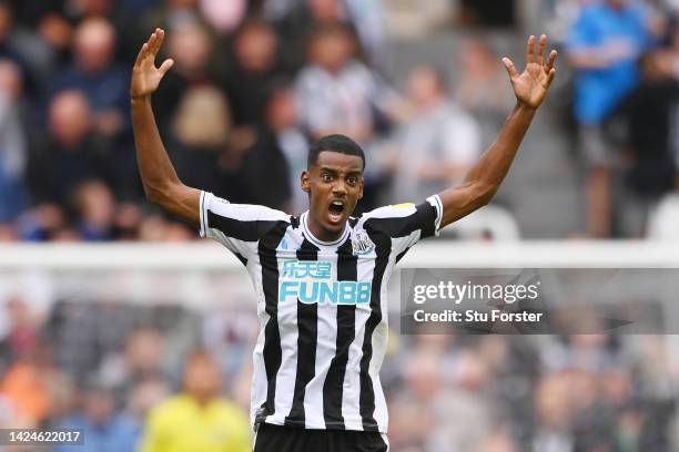 Alexander Isak of Newcastle United celebrates after scoring their side's first goal during the Premier League match between Newcastle United and AFC...