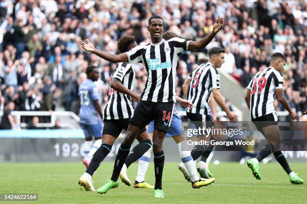 Alexander Isak of Newcastle United celebrates after scoring their side's first goal during the Premier League match between Newcastle United and AFC...