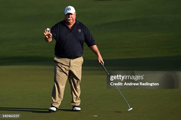 Craig Stadler reacts after sinking his putt on the second hole during the first round of the 2012 Masters Tournament at Augusta National Golf Club on...