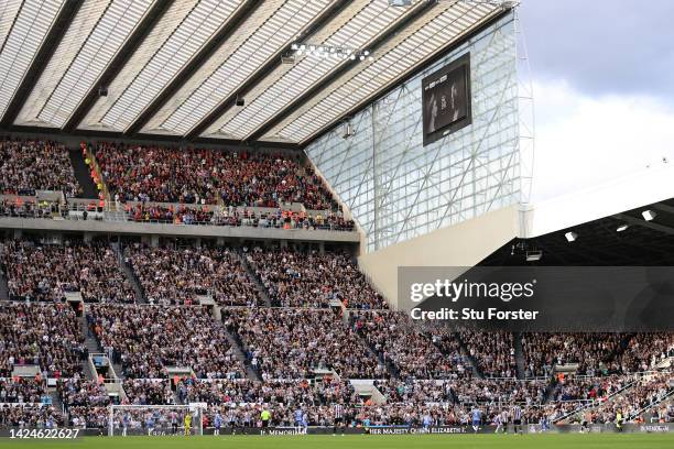 Fans take part in an applause on the 70th minute as a tribute to Her Majesty Queen Elizabeth II who died at Balmoral Castle on September 8 during the...