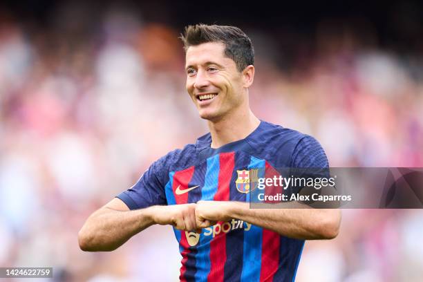 Robert Lewandowski of FC Barcelona celebrates after scoring his team's third goal during the LaLiga Santander match between FC Barcelona and Elche CF...