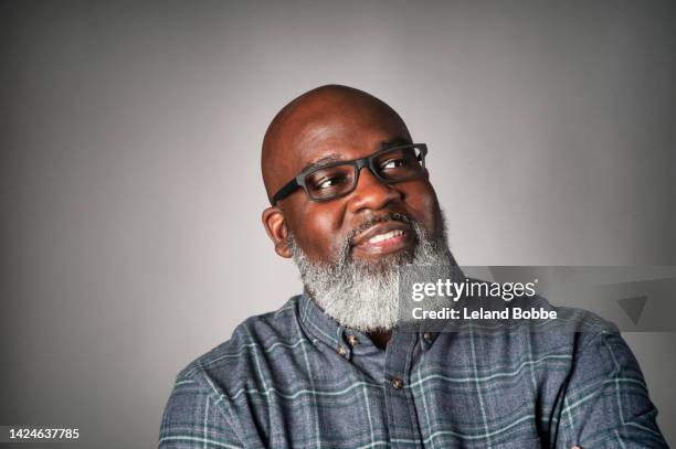portrait of middle aged african american male - black man plaid shirt stock pictures, royalty-free photos & images