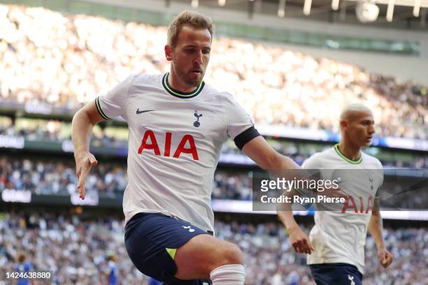 Harry Kane of Tottenham Hotspur celebrates after scoring their team's first goal during the Premier League match between Tottenham Hotspur and...