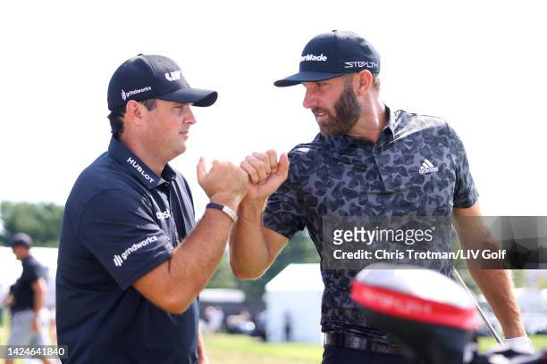 Team Captain Dustin Johnson and Patrick Reed of 4 Aces GC are seen on the driving range during Day Two of the LIV Golf Invitational - Chicago at Rich...
