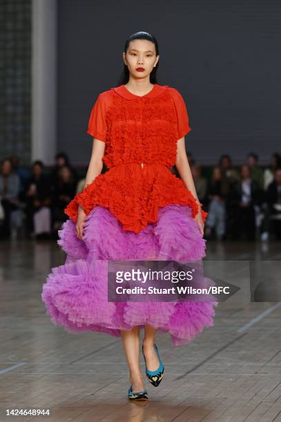 Model walks the runway during the Molly Goddard show during London Fashion Week September 2022 on September 17, 2022 in London, England.