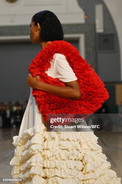 Model walks the runway during the Molly Goddard show during London Fashion Week September 2022 on September 17, 2022 in London, England.