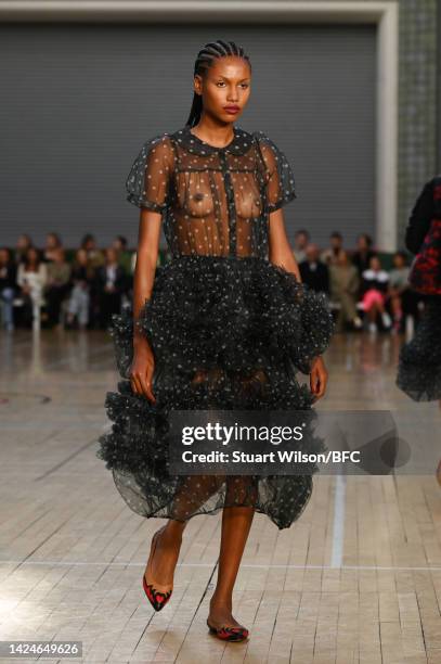 Model walks the runway during the Molly Goddard show during London Fashion Week September 2022 on September 17, 2022 in London, England.