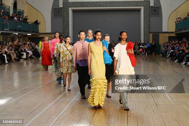 Models walk the runway during Finale at the Molly Goddard show during London Fashion Week September 2022 on September 17, 2022 in London, England.