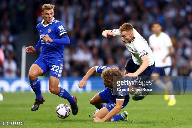 Dejan Kulusevski of Tottenham Hotspur is tackled by Wout Faes of Leicester City during the Premier League match between Tottenham Hotspur and...
