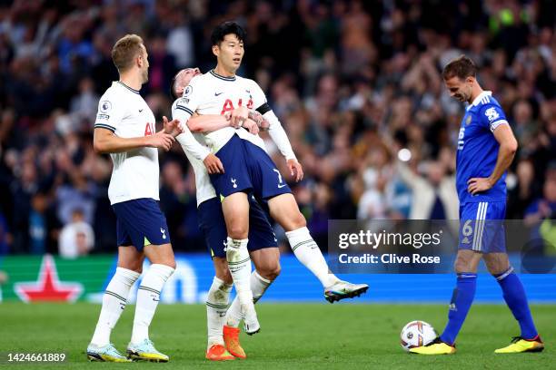 Son Heung-Min of Tottenham Hotspur celebrates with teammates after scoring their team's sixth goal and hat trick during the Premier League match...