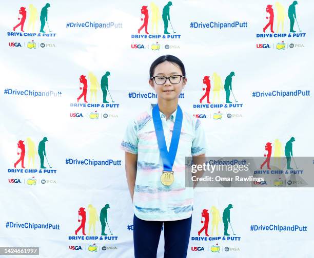 First place winner of the girls 10-11 division Alexandra Phung after Drive, Chip & Putt regional qualifier at TPC Boston on September 17, 2022 in...
