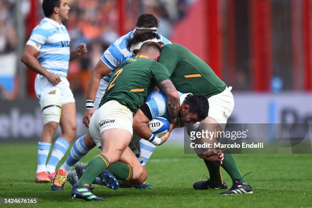 Matias Alemanno of Argentina is tackled during a Rugby Championship match between Argentina Pumas and South Africa Springboks at Estadio Libertadores...