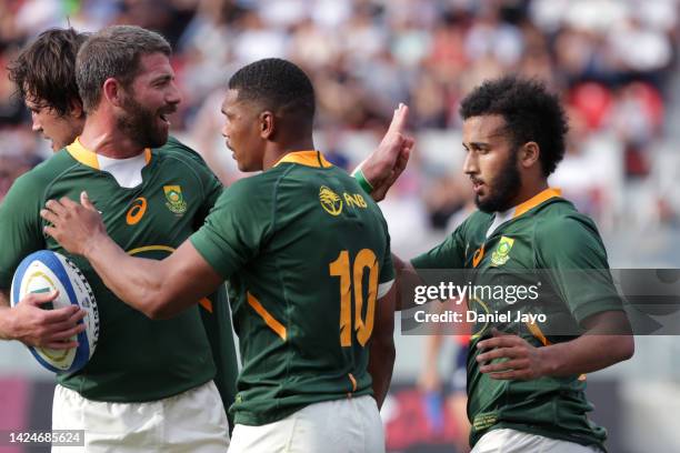 Jaden Hendrikse of South Africa celebrates with teammates after scoring a try during a Rugby Championship match between Argentina Pumas and South...