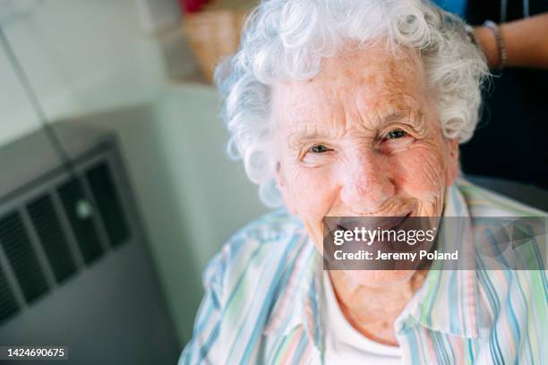 beautiful, sharp, intelligent elderly senior caucasian woman's unique speckled pretty eyes and face indoors - 109 stock pictures, royalty-free photos & images