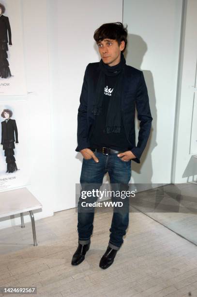 Fashion designer Hedi Slimane attends Chanel\'s THEN NOW exhibit at Visionaire Gallery.