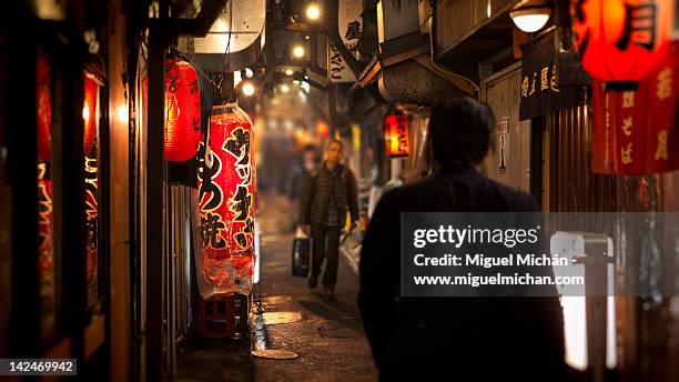 omoide yokocho shinjuku - tokyo japan night alley stock pictures, royalty-free photos & images