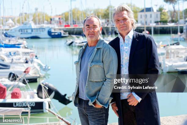 Bruno Solo and Yvan le Bolloc'h attends the "Camera Cafe" photocall during the La Rochelle Fiction Festival - Day Five on September 17, 2022 in La...