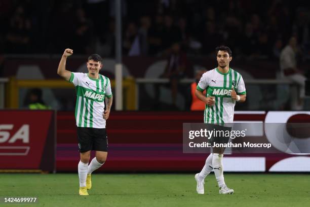 Agustin Alvarez of US Sassuolo celebrates with team mates after scoring to give the side a 1-0 lead during the Serie A match between Torino FC and US...