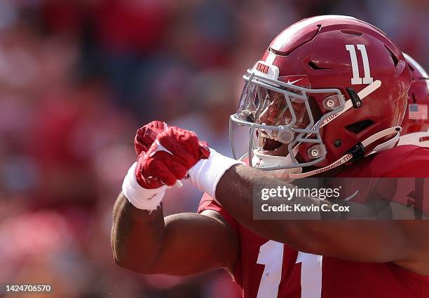 Traeshon Holden of the Alabama Crimson Tide reacts after pulling in a touchdown against the Louisiana Monroe Warhawks during the first quarter at...