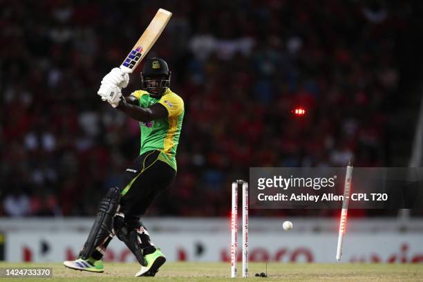 Rovman Powell of Jamaica Tallawahs is bowled by Ravi Rampaul of Trinbago Knight Riders during the Men's 2022 Hero Caribbean Premier League match...