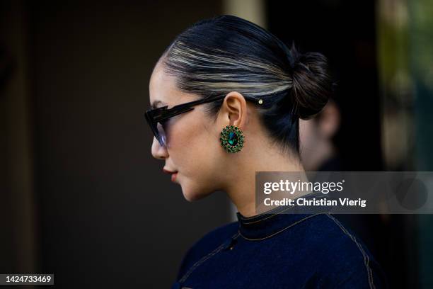 Betty Bachz wears earrings outside Huishan Zhang during London Fashion Week September 2022 on September 17, 2022 in London, England.