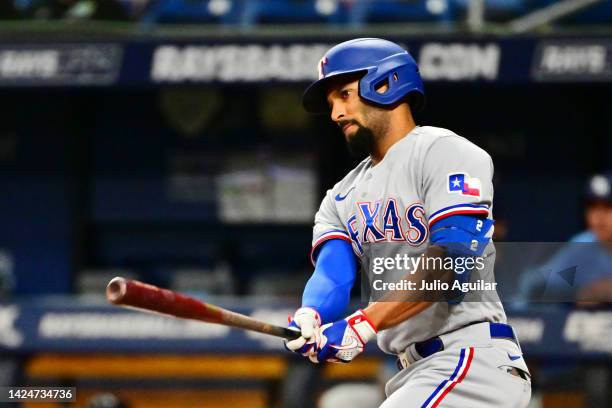 Marcus Semien of the Texas Rangers hits a double in the first inning against the Tampa Bay Rays at Tropicana Field on September 17, 2022 in St...