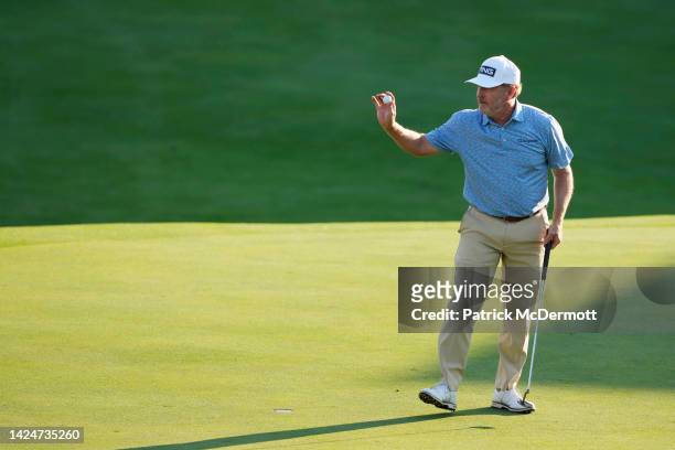 Jeff Maggert of the United States reacts after making a birdie putt on the 18th green during the second round of the Sanford International at...