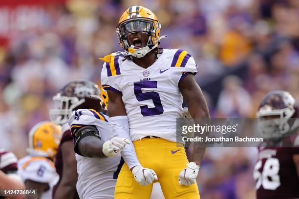 Jay Ward of the LSU Tigers celebrates a tackle during the first half of a game against the Mississippi State Bulldogs at Tiger Stadium on September...
