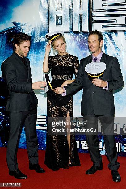 Actors Taylor Kitsch and Brooklyn Decker and director Peter Burg attend the 'Battleship' South Korea Premiere at Coex Mega Box on April 5, 2012 in...