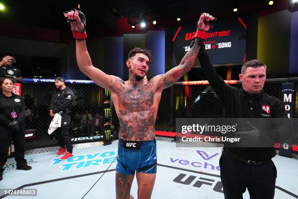 Andre Fili reacts after defeating Bill Algeo by split decision in a featherweight fight during the UFC Fight Night event at UFC APEX on September 17,...