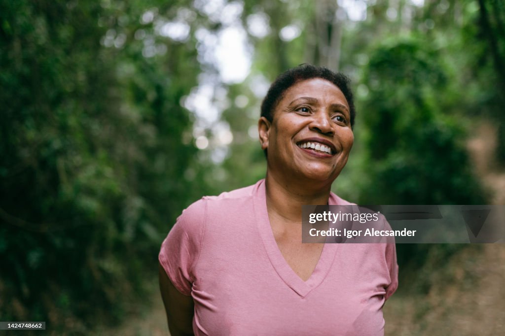 Mature woman contemplating nature
