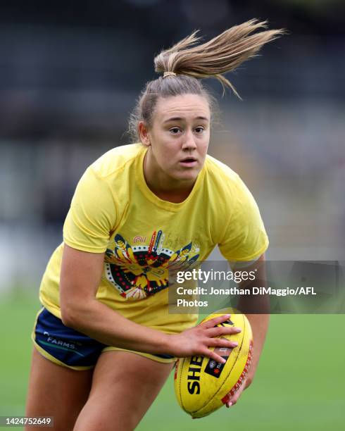 Hannah Munyard of the Crows is pictured warming up during the round four AFLW match between the Collingwood Magpies and the Adelaide Crows at...