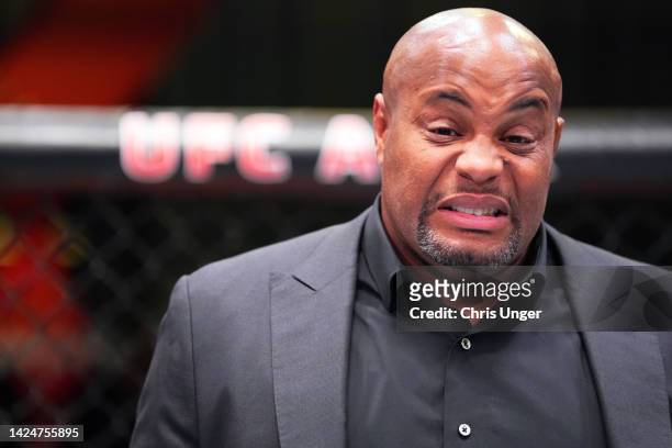 Daniel Cormier reacts after seeing a cut on Gregory Rodrigues of Brazil after a middleweight fight during the UFC Fight Night event at UFC APEX on...